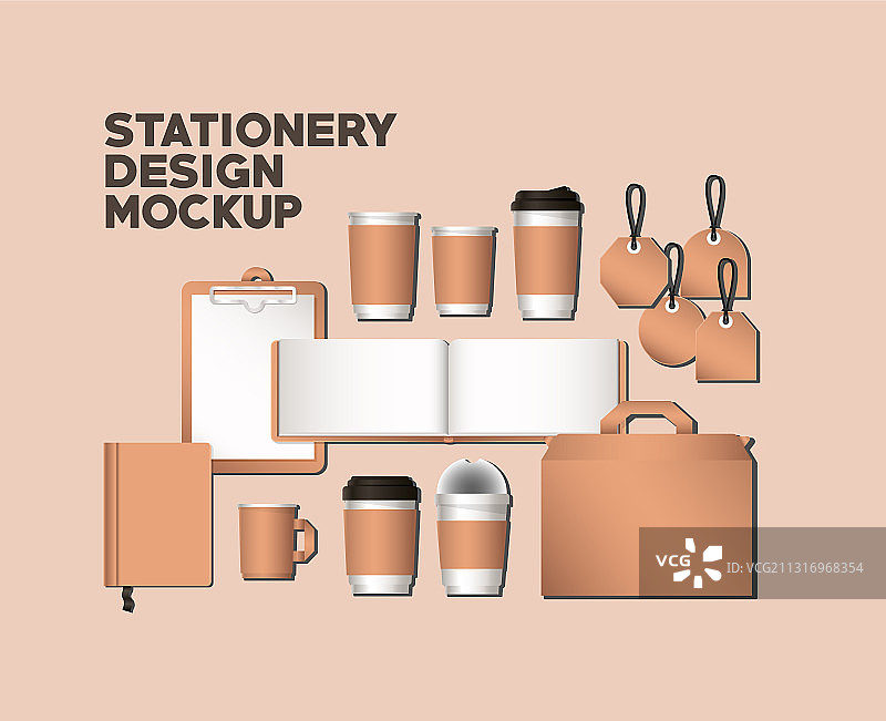 橙色背景上的马克杯和模型套件图片素材