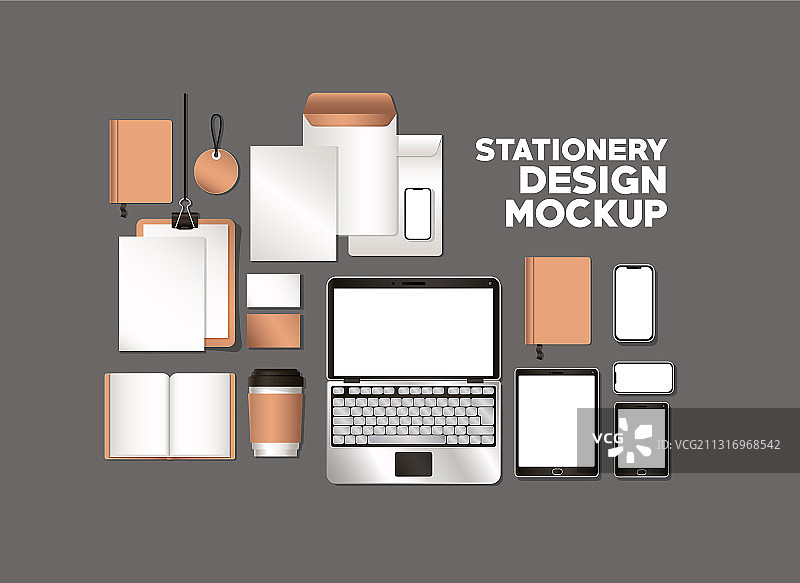 灰色背景上的笔记本电脑和模型套件图片素材