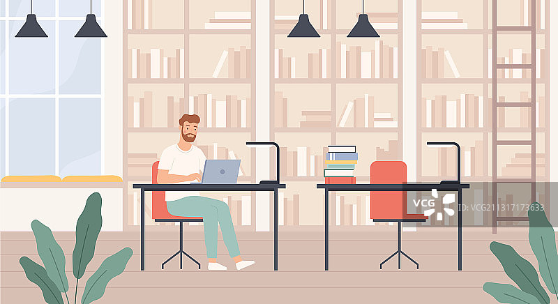 在公共图书馆里的年轻男人图片素材