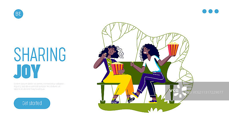 两个女孩吃爆米花零食的着陆页图片素材