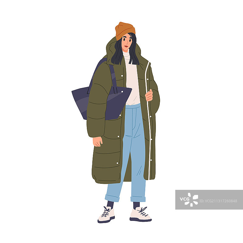 身穿羽绒服和帽子的时尚年轻女人图片素材