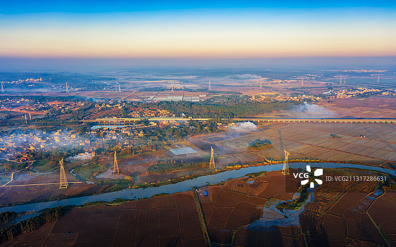 广东省湛江市雷州市农村弯曲的河流日出自然风光图片素材