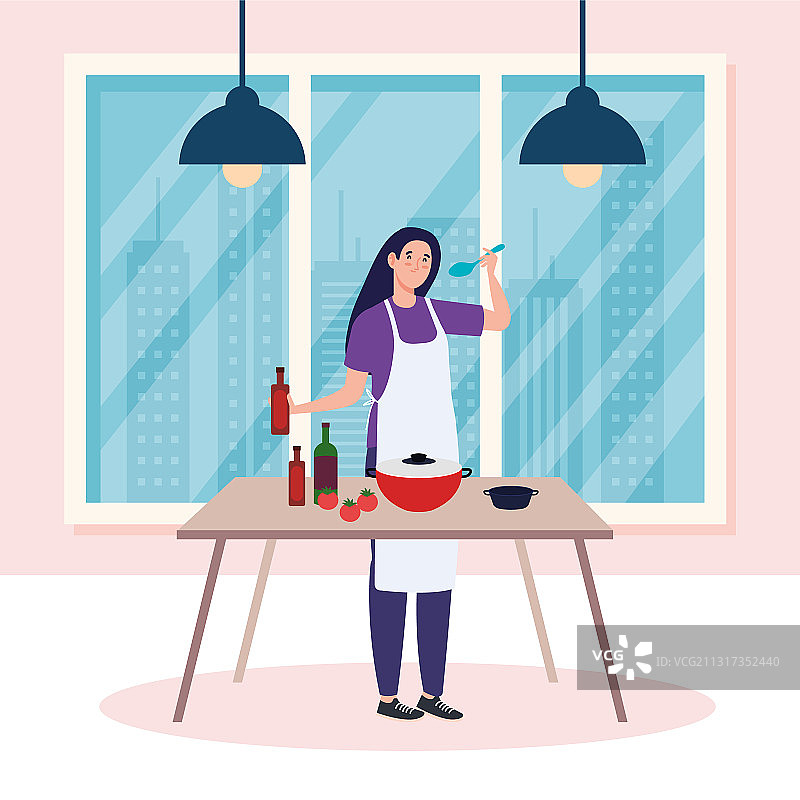 在房子桌子上使用围裙烹饪的女人图片素材