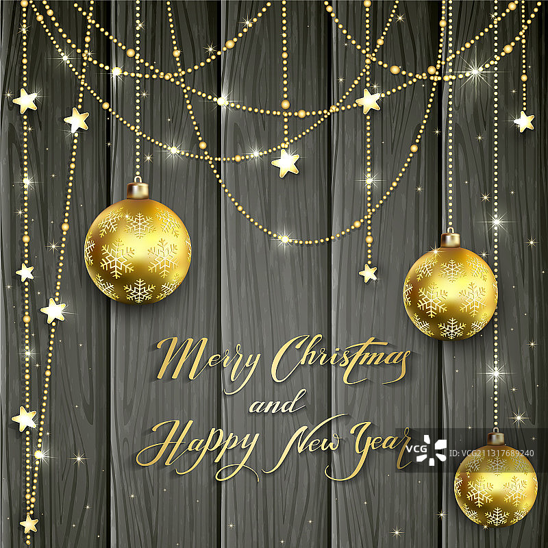 黑色背景上的金色圣诞球和装饰品图片素材