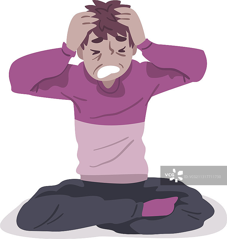 盘腿坐在地板上的沮丧男人图片素材