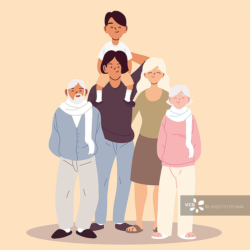 幸福的家庭：父母、祖父母和男孩图片素材