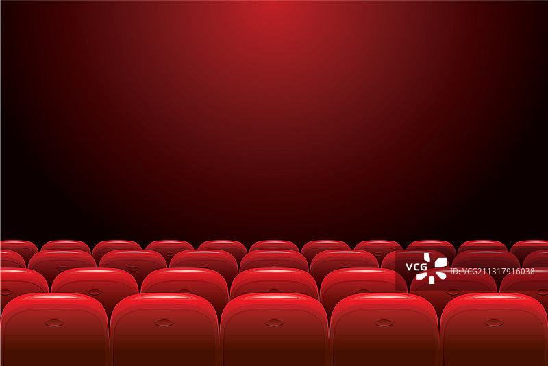 深色背景上的红色座椅空电影院图片素材