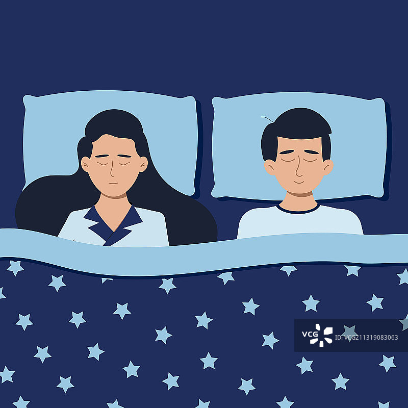 男人和女人穿着睡衣在床上睡觉图片素材