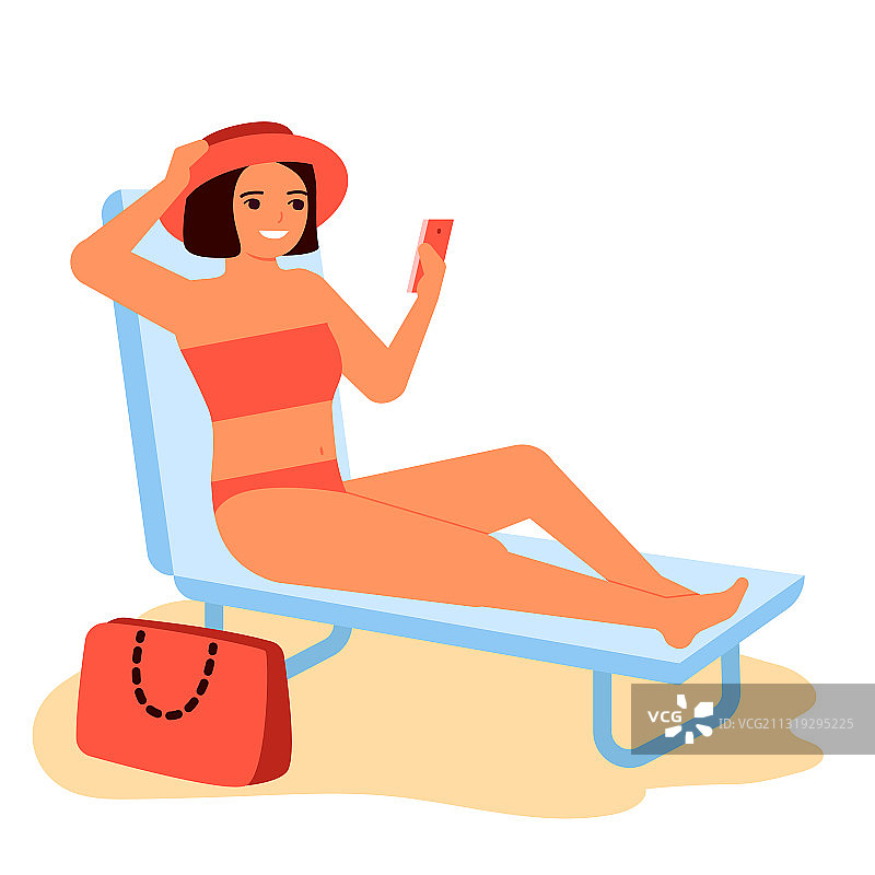 年轻女子在日光躺椅上穿着泳衣享受日光浴图片素材