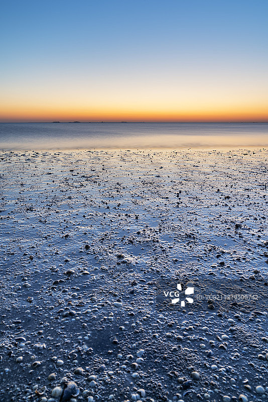 德国北部弗里西亚群岛佩尔沃姆岛瓦登海的日落图片素材