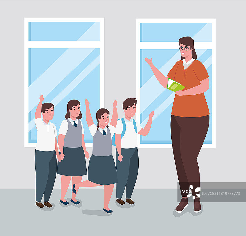 女教师与学生在教室里图片素材