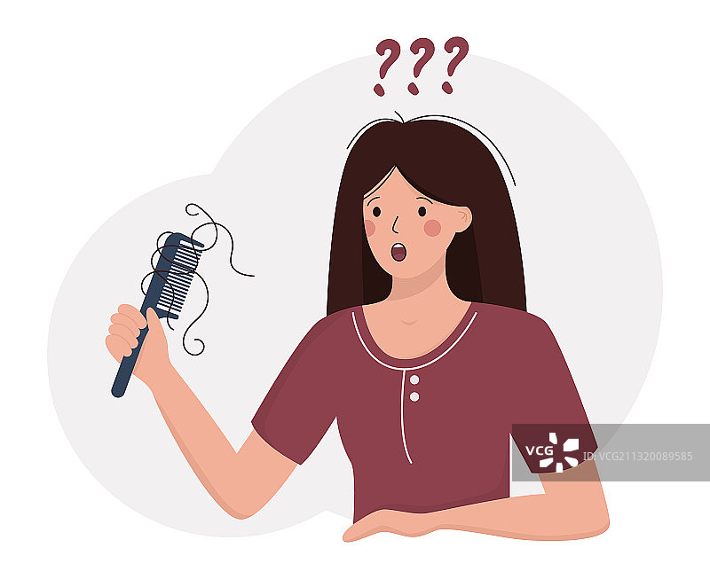 患有脱发症的女人用梳子梳头时掉发图片素材