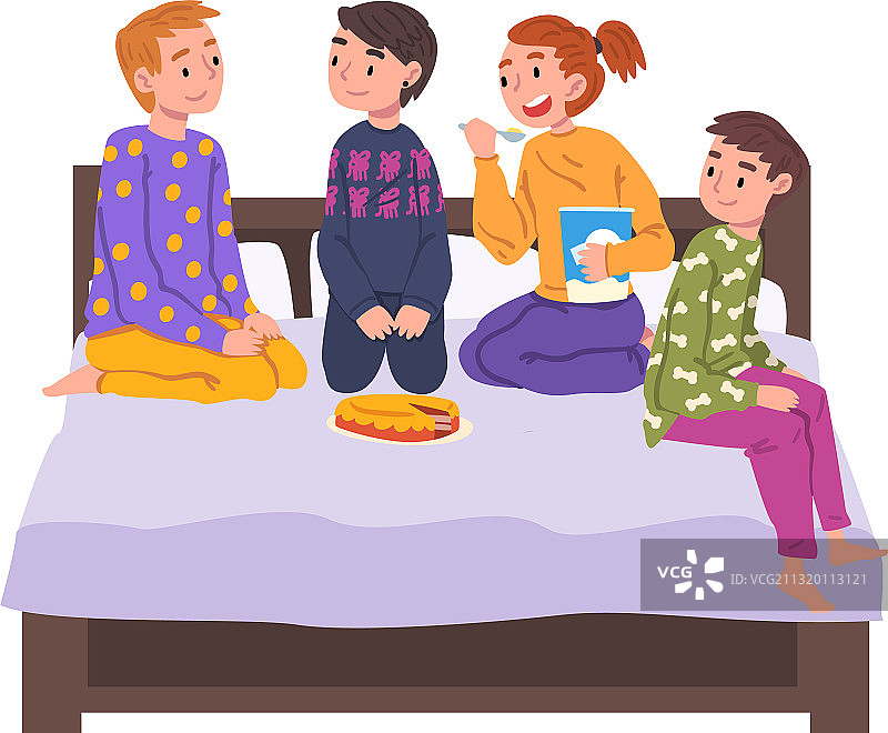 穿着睡衣坐在床上的可爱儿童图片素材