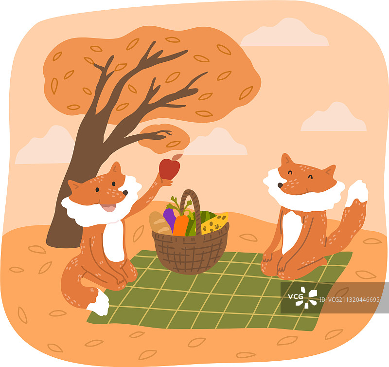 微笑的狐狸坐着，享受新鲜的野餐图片素材