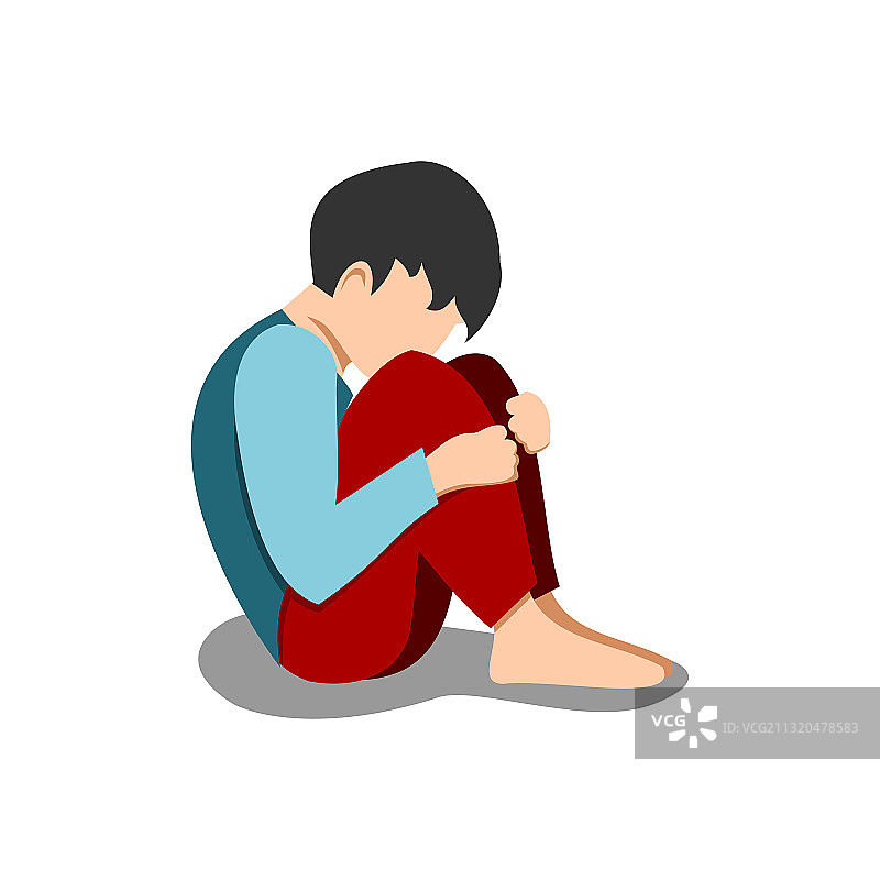 悲伤的年轻男孩坐着拥抱图片素材