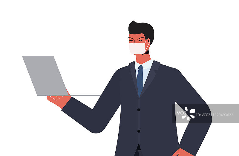 商人戴着口罩使用笔记本电脑图片素材