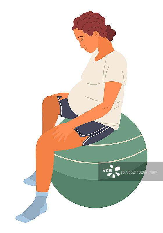 孕妇坐在健身球上图片素材