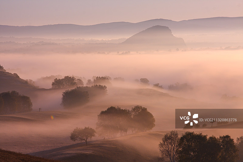 内蒙古敖包吐日出晨雾图片素材
