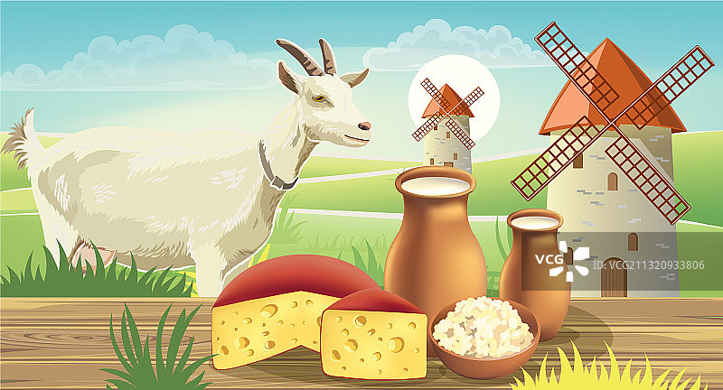 风车旁草地上桌子边的山羊图片素材