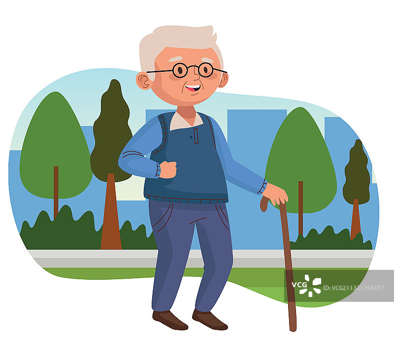老年男人在公园里拄着拐杖散步图片素材
