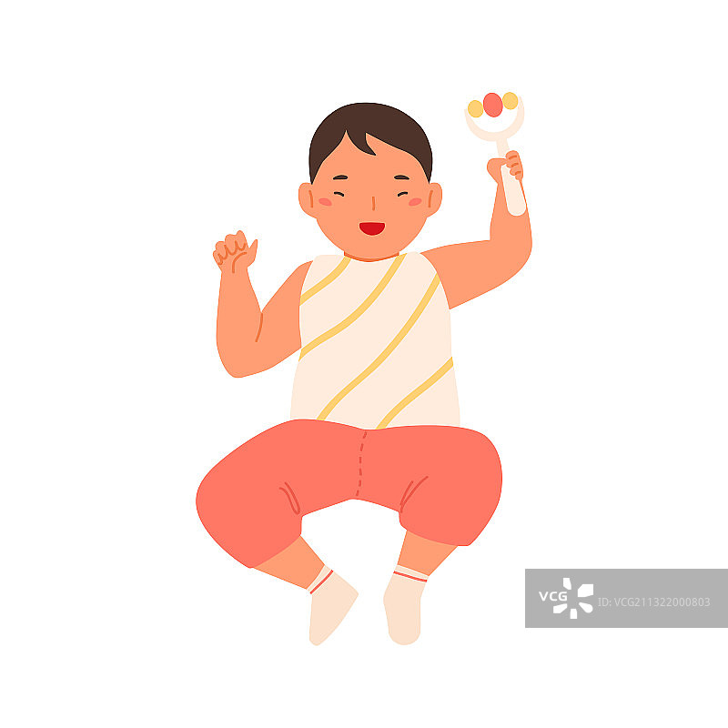 快乐可爱的宝宝拿着拨浪鼓图片素材