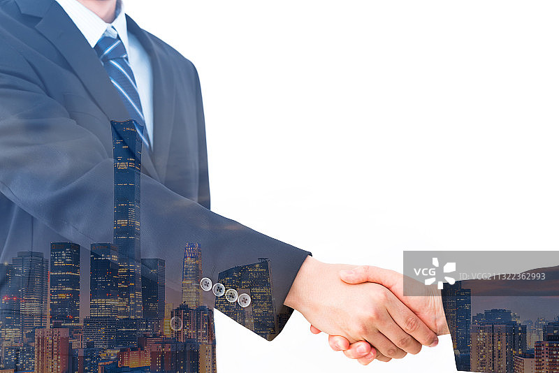 城市高楼背景下握手合成照片图片素材