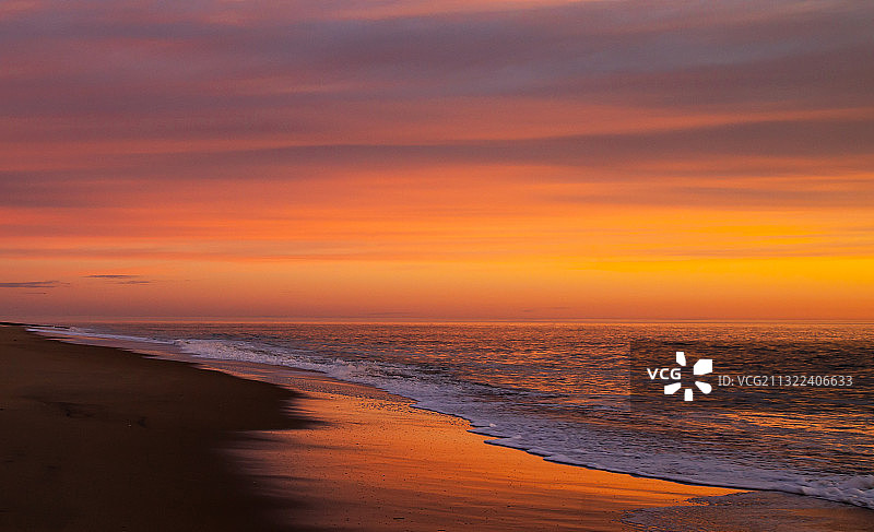 日落时分美国特拉华州贝瑟尼海滩的迷人景色图片素材