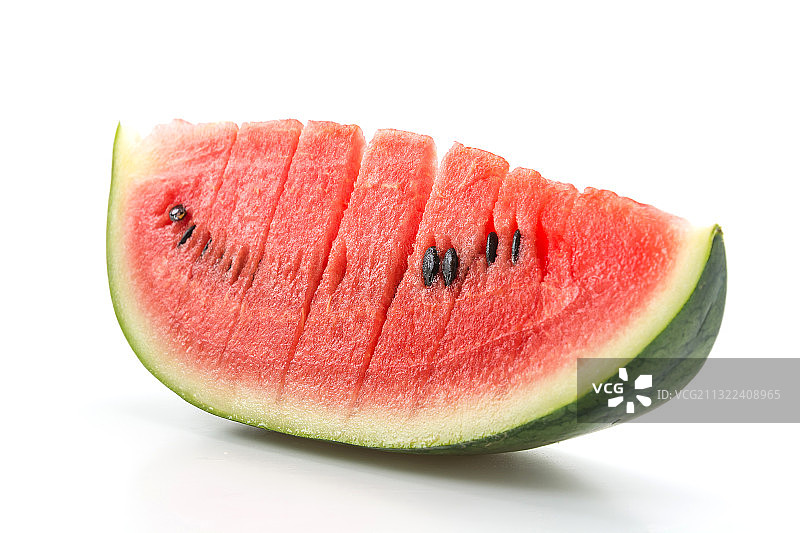白色背景下的西瓜切片特写图片素材