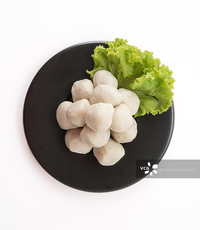 白色背景下碗中食物特写图片素材