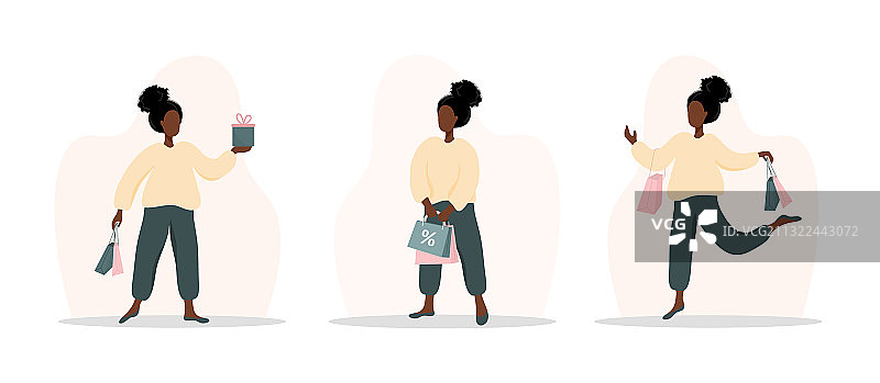 快乐的非洲女孩携带购物袋购物图片素材