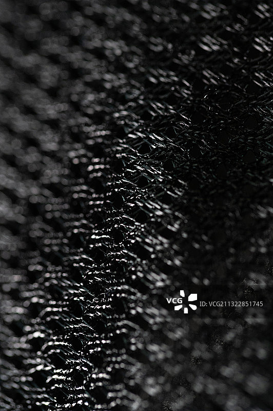 微距物质纤维，整齐排列的孔，衣服物料尼龙物质聚酯纤维，网格图片素材