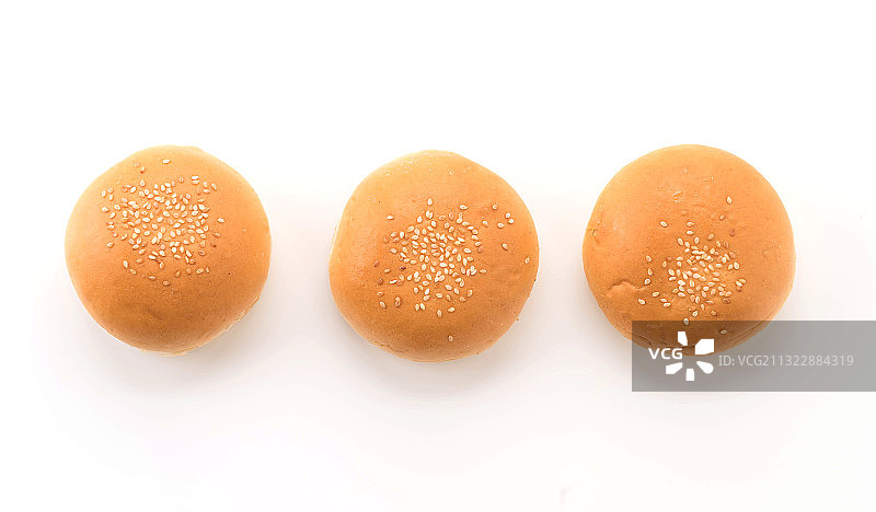 白色背景下的面包特写图片素材