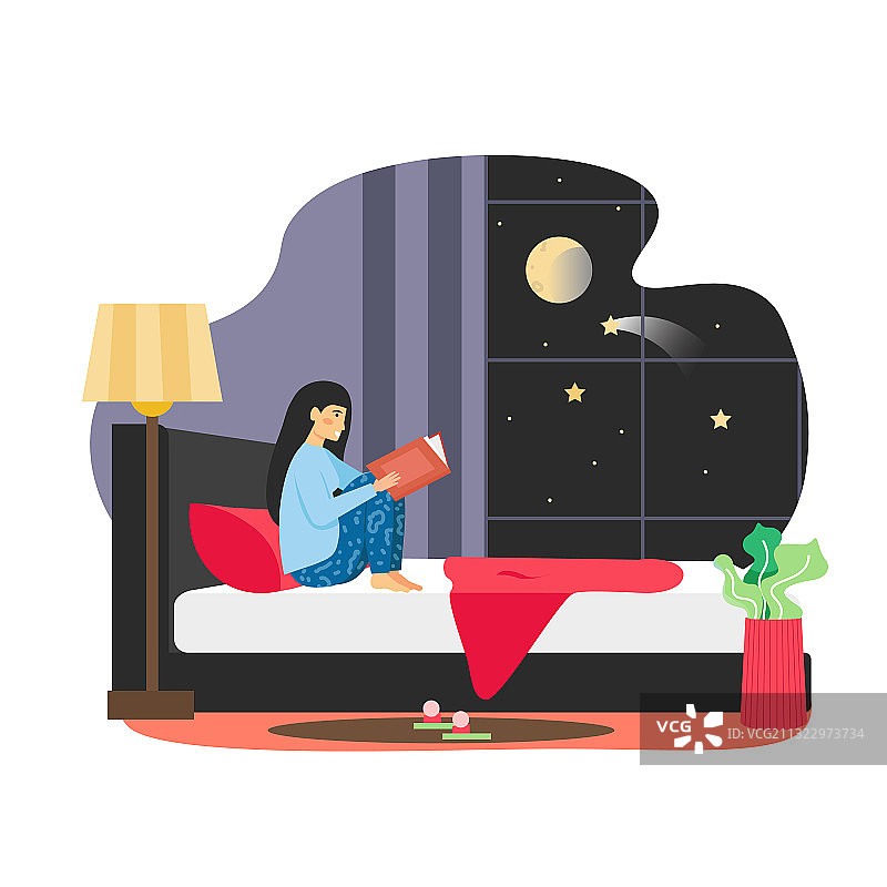 日常生活：年轻女人在床上读书图片素材