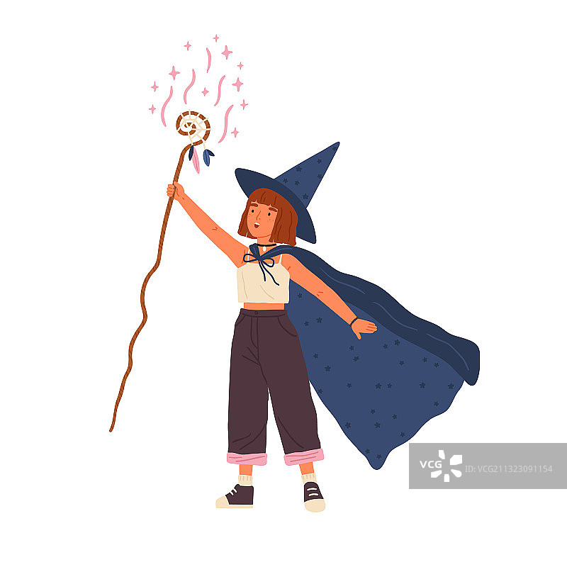 戴着巫师帽和斗篷的可爱女孩在变戏法图片素材
