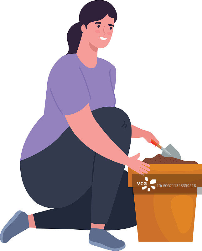 园艺：拿铲子和花盆的女人图片素材