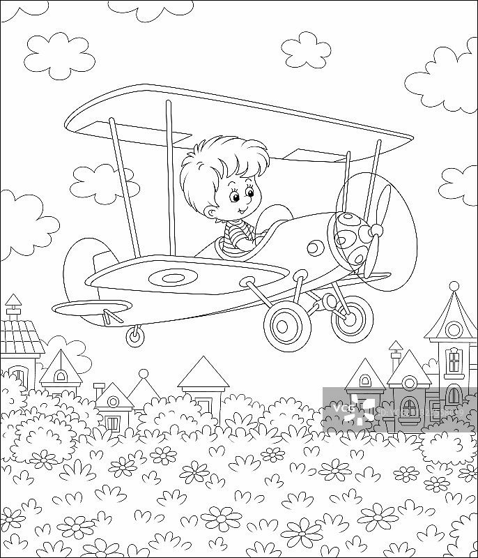 小飞行员驾驶飞机飞越城镇图片素材