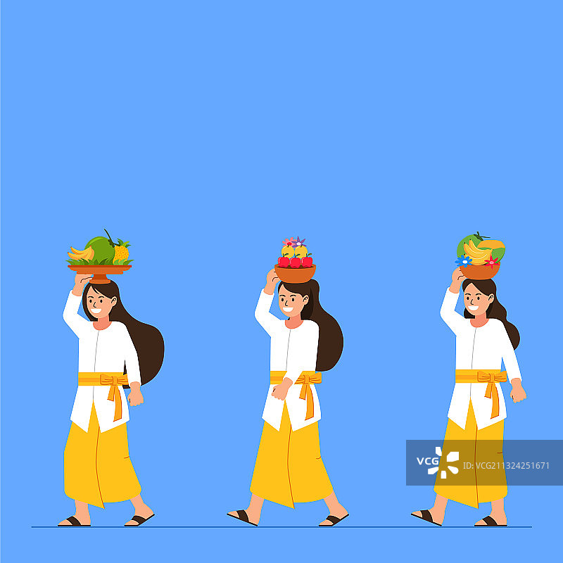 巴厘岛女孩手捧祭祀水果行走图片素材