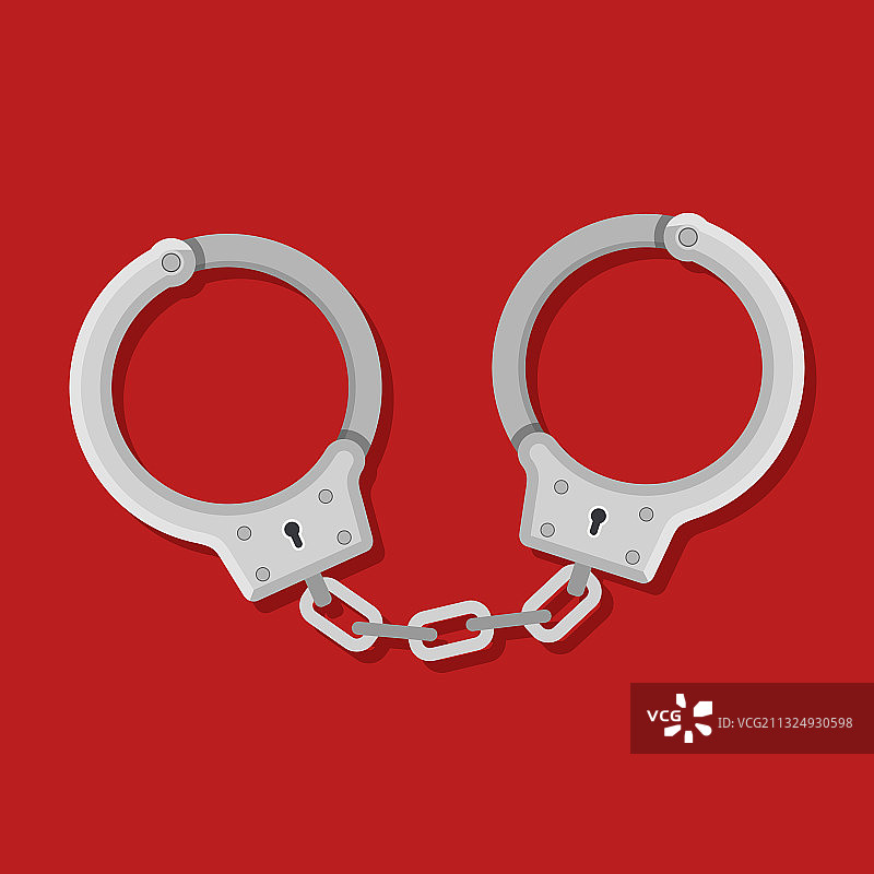 红色背景上拘捕罪犯的金属手铐图片素材