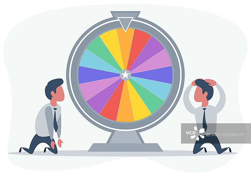 跪在幸运轮盘附近的人图片素材