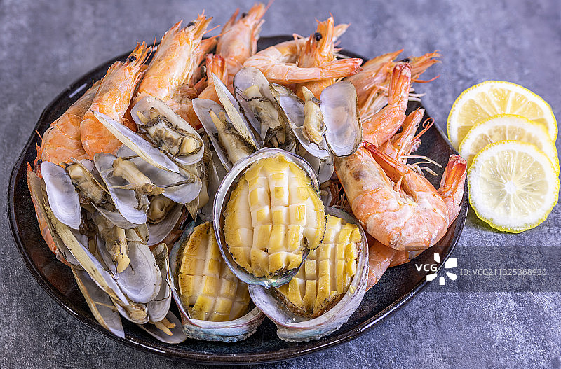 盐焗海鲜组合特写图片素材