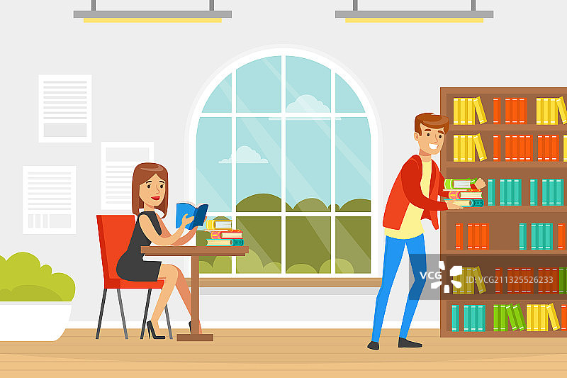 学生在图书馆选择和阅读书籍图片素材