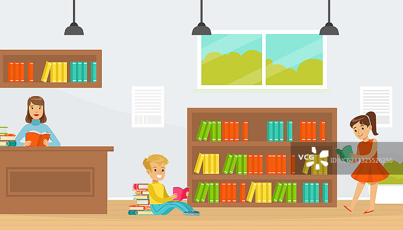 孩子们在图书馆选择和阅读书籍图片素材