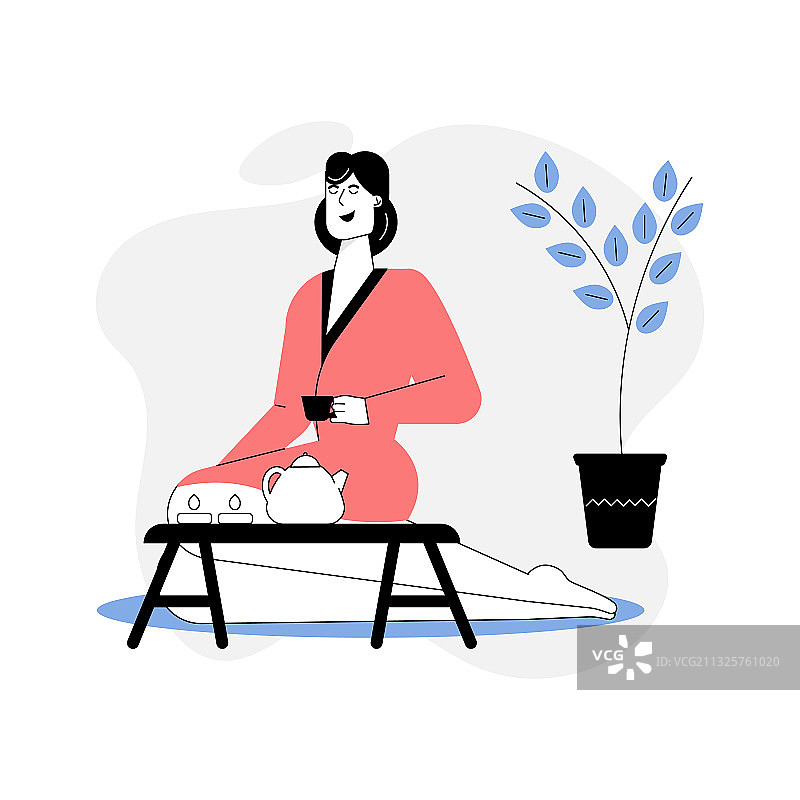 身穿浴袍在水疗沙龙放松饮用的女人图片素材