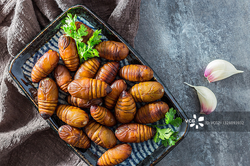 蚕蛹烧烤美食图片素材