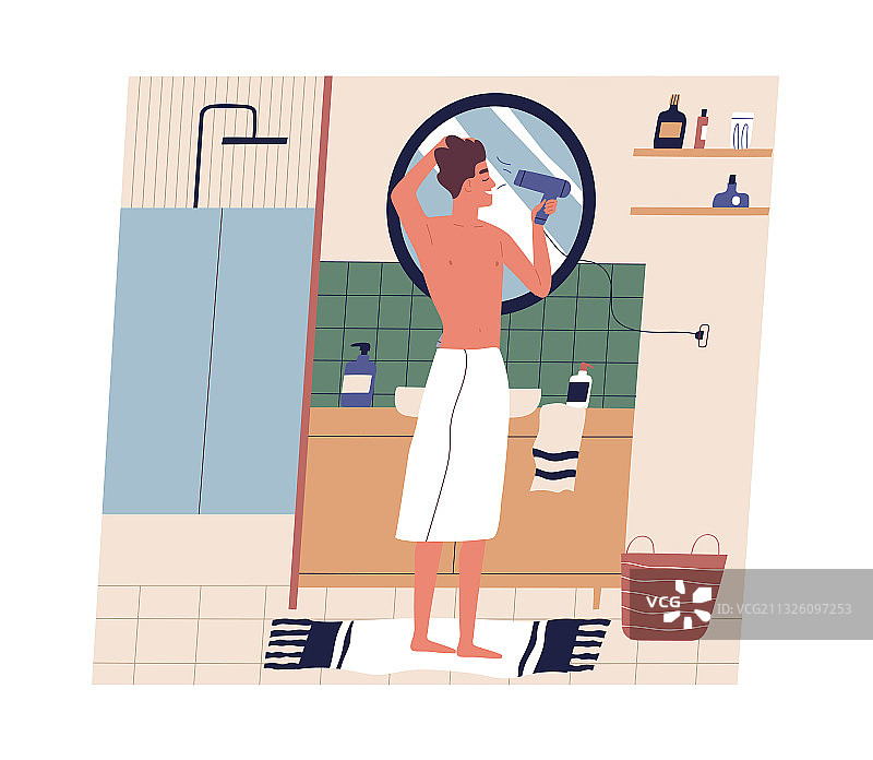 年轻男子在浴室用吹风机吹干头发图片素材