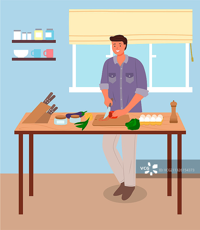 站在厨房桌子旁的男人图片素材