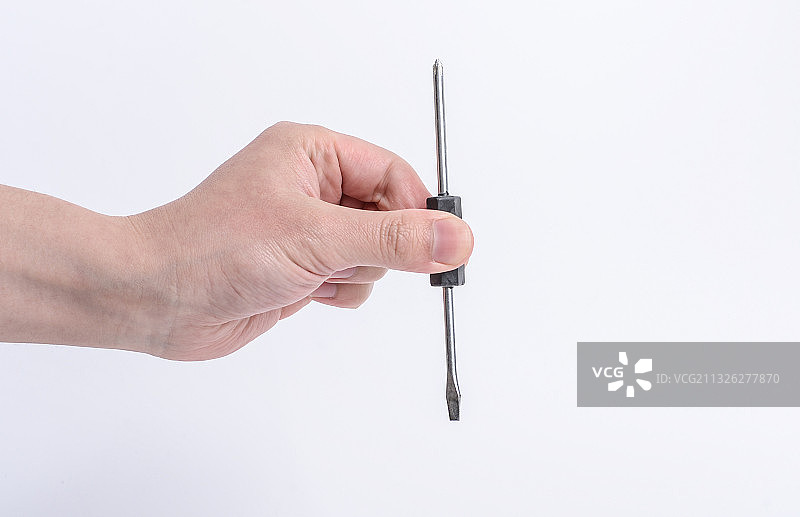 男性手拿工具图片素材