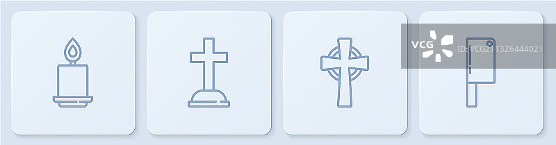 带十字架的墓碑上的燃烧蜡烛图片素材