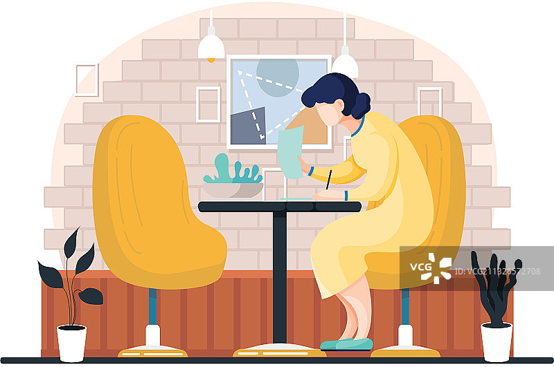 身穿黄色连衣裙的女人在写日记或手账图片素材