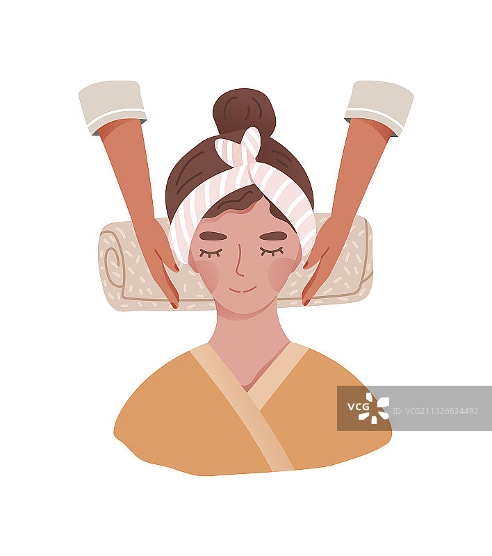 按摩师为女人做面部按摩图片素材